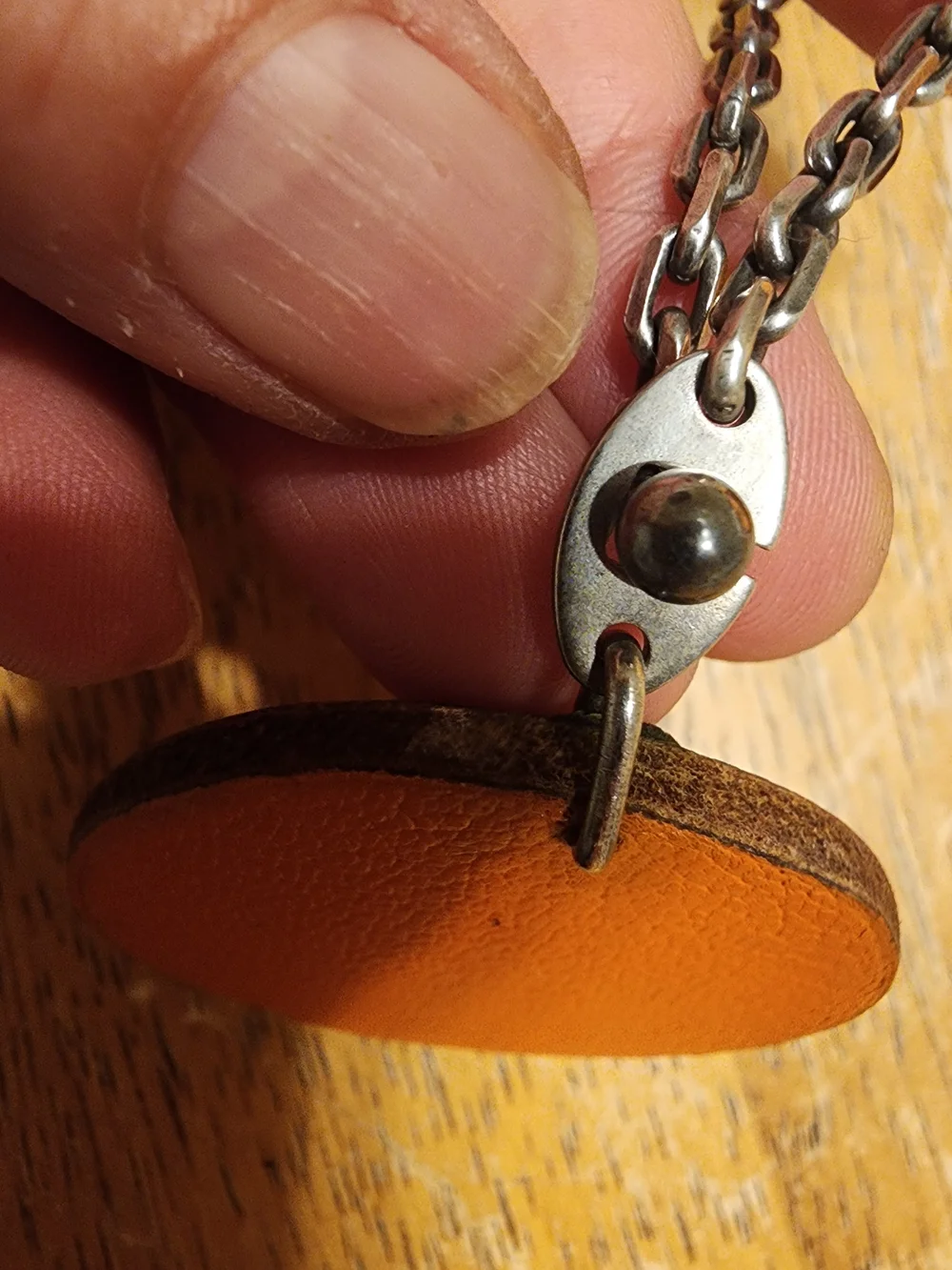 authentic Hermès orange fruit leather bag charm and keychain